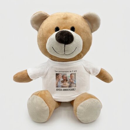 En plus, un ours en peluche personnalisé avec une photo et un texte