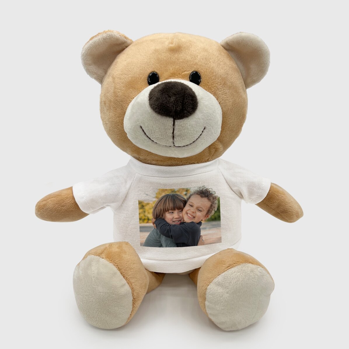 En plus, un ours en peluche personnalisé avec une photo
