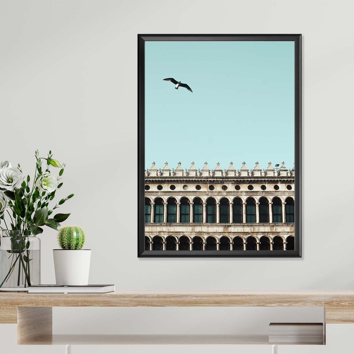 Affiche représentant un oiseau et un bâtiment