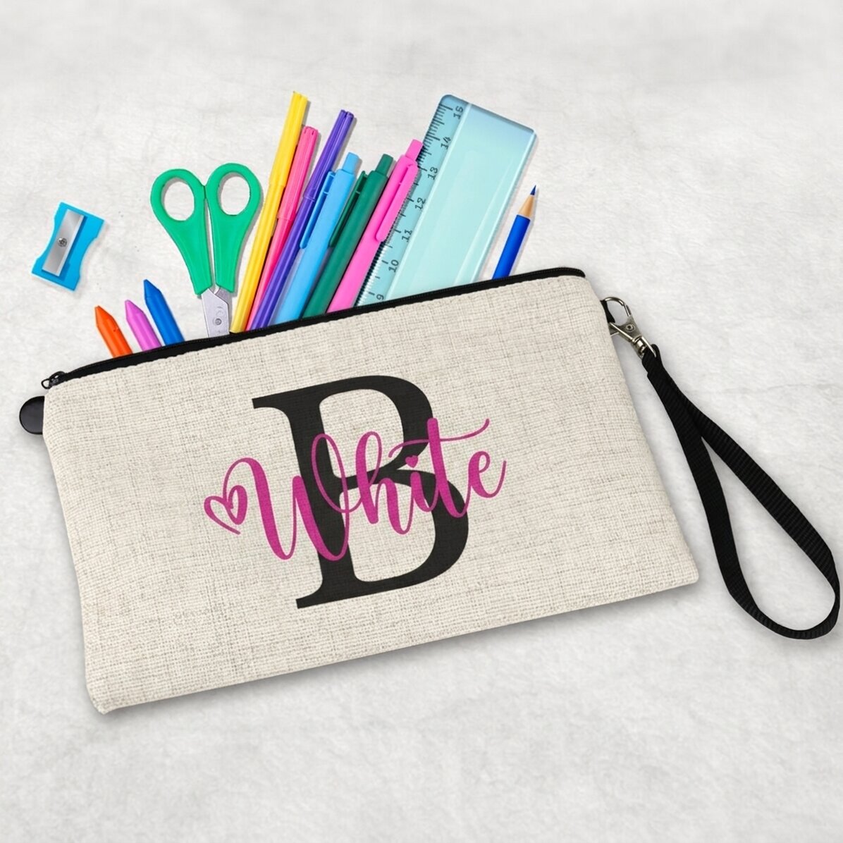 Trousse scolaire personnalisée avec une initiale et un prénom