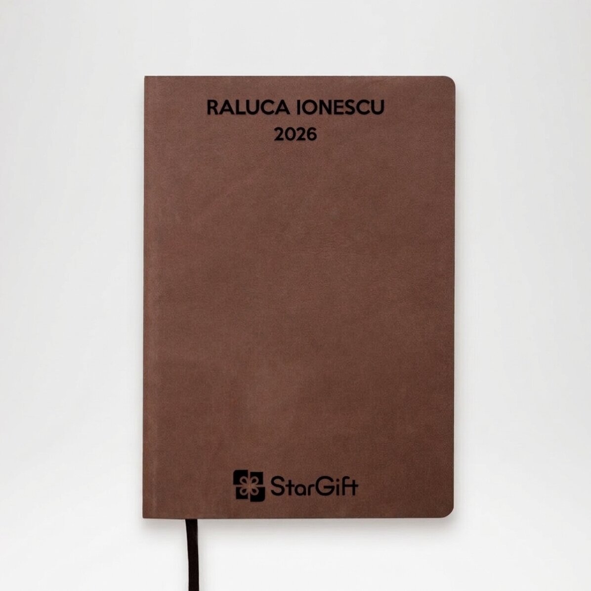 Agenda en cuir personnalisé avec un logo au centre et un texte