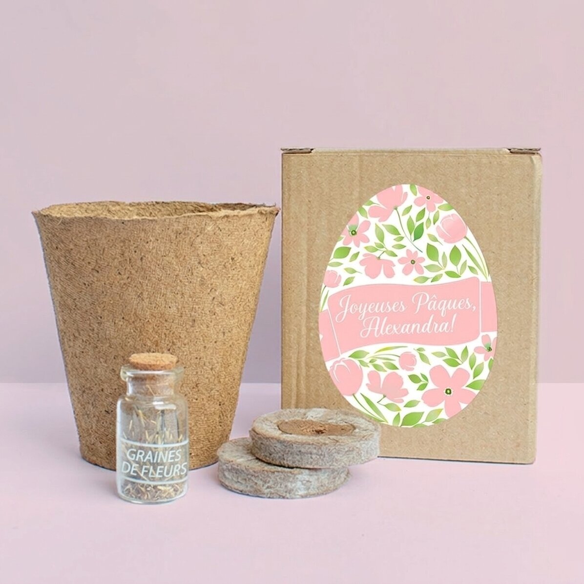 Kit de plantation de fleurs dans une petite boîte personnalisée avec le message « Joyeuses Pâques ! 