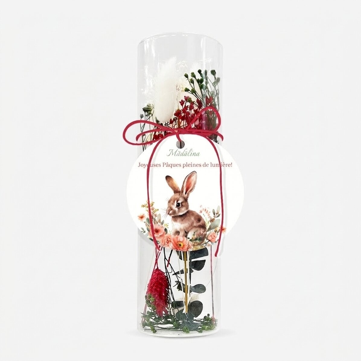 Décoration en verre avec des fleurs stabilisées, personnalisée avec le message « Joyeuses Pâques ! »